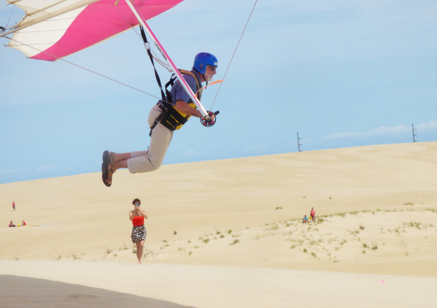 Kitty Hawk Kites President and founder, John Harris, launching from Jockey's Ridge on Saturday.