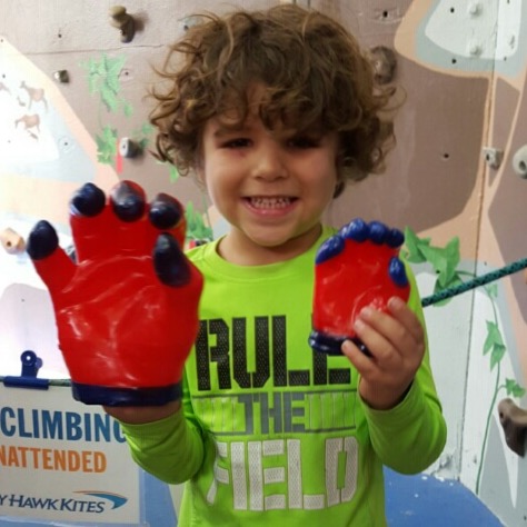 Little boy with wax hands at kids days