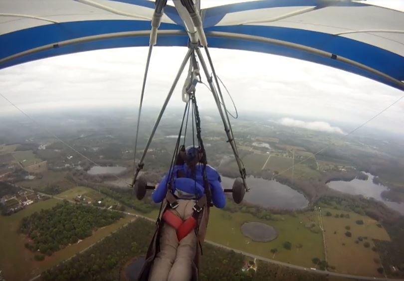 Sara Weaver flying a hang glider