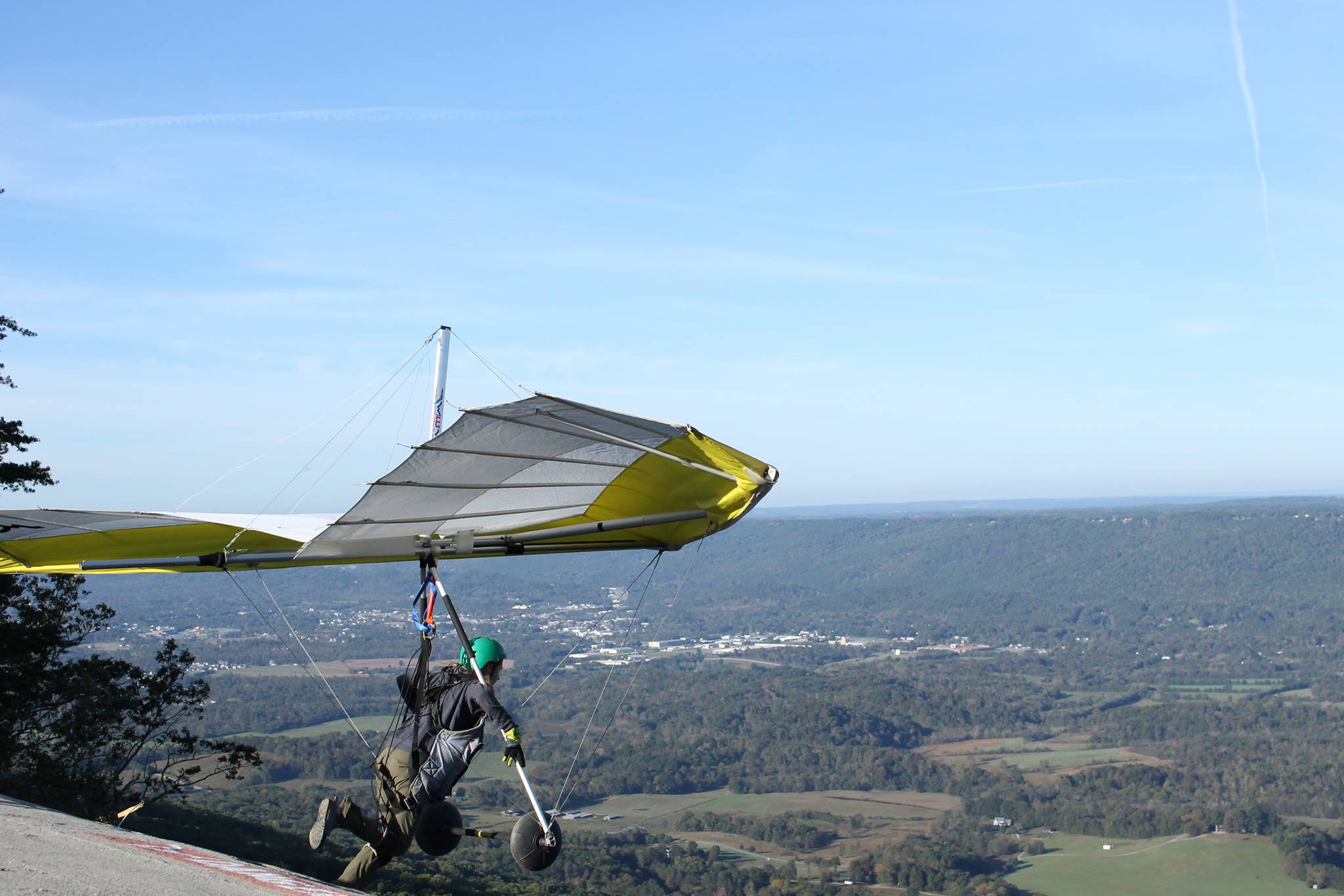 Sara Weaver launching off a mountain