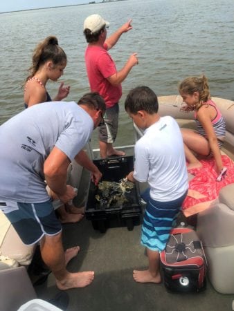 obxpontoonman lwilson004 338x450 - Inshore Excursions: Crabbing, Fishing & Island Exploration