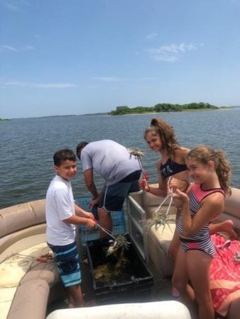 obxpontoonman lwilson006 338x450 - Inshore Excursions: Crabbing, Fishing & Island Exploration