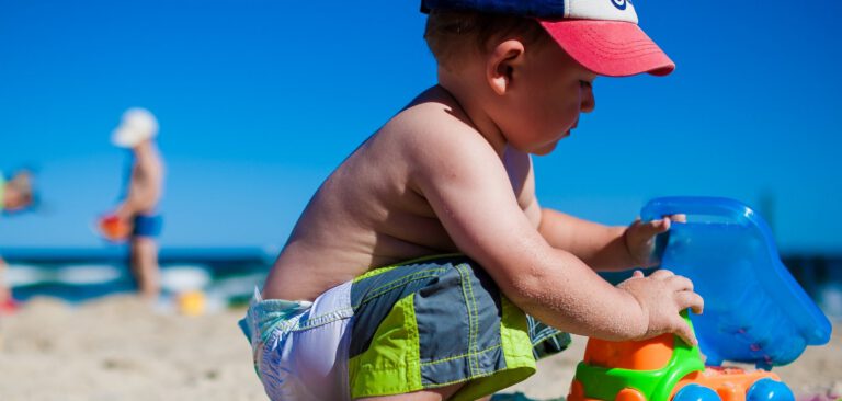 boy playing on the beach
